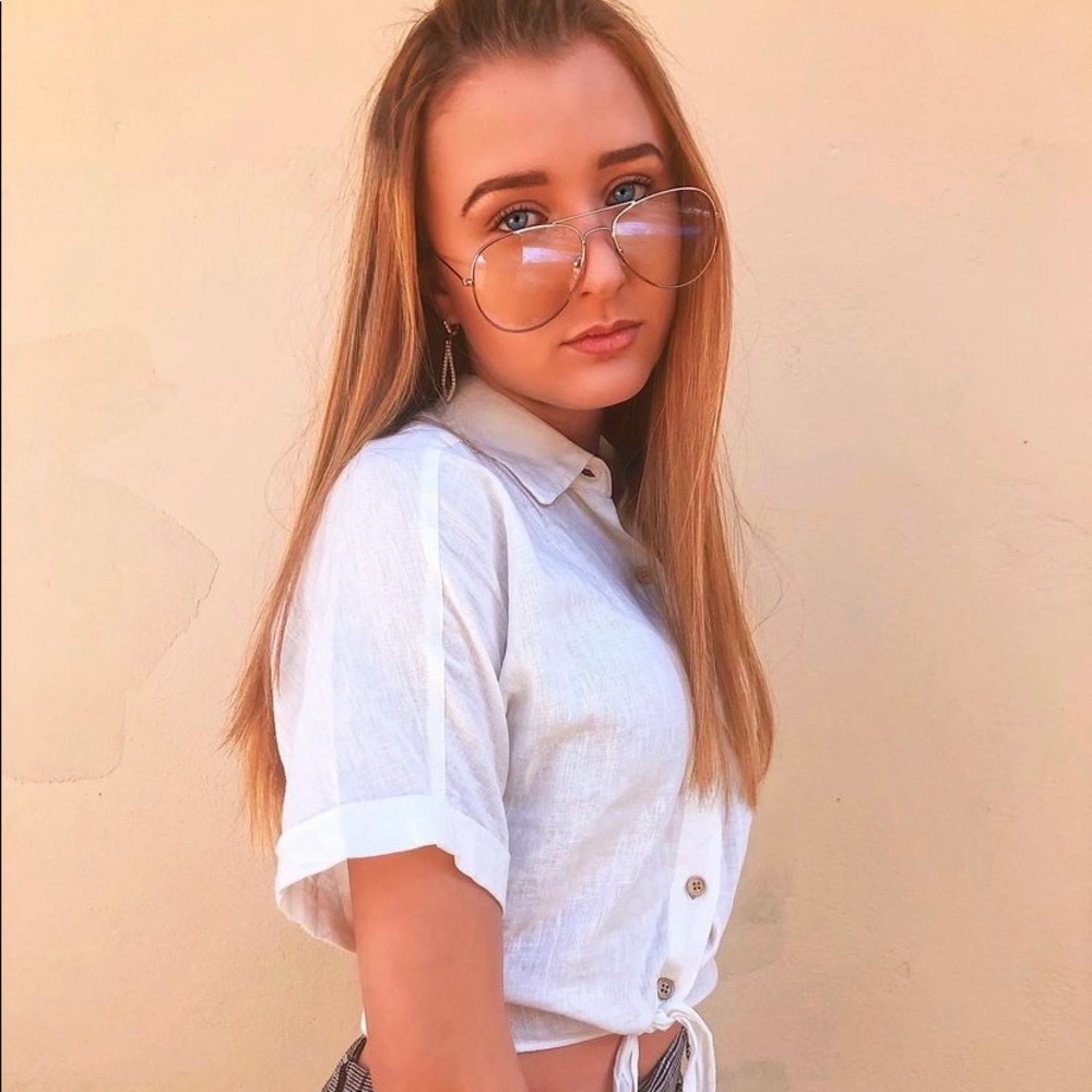 Selling this button up tee, size XS, Store: garageclothing, white/ cream color